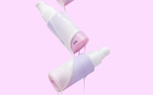 visible improvement dual action serum on a pink background