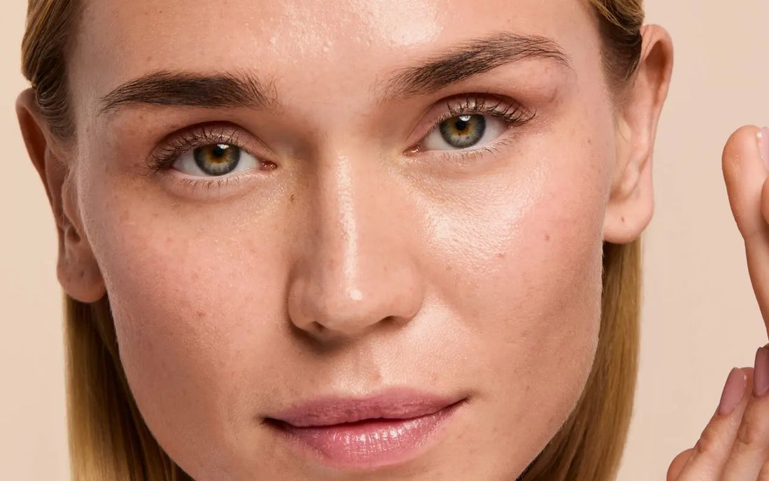 Close-up of a woman's face with clear, healthy skin, highlighting the importance of debunking skincare myths and following proper skincare practices.